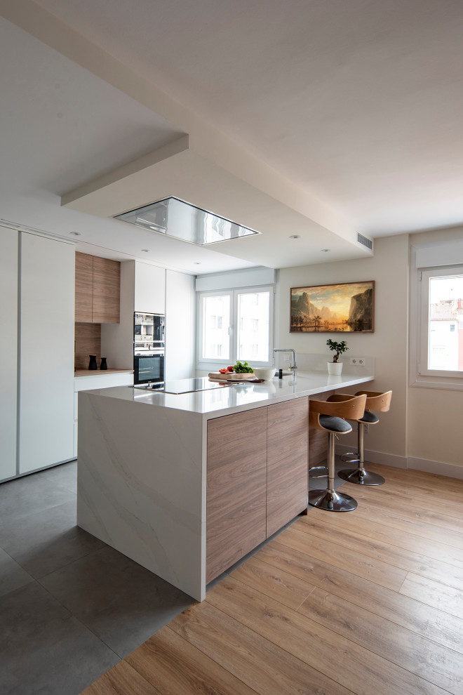 Una cocina con península abierta al comedor - Kitchen - Other - by ...