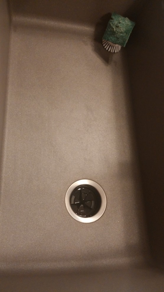 Dark spots/stains on grey silgranit sink