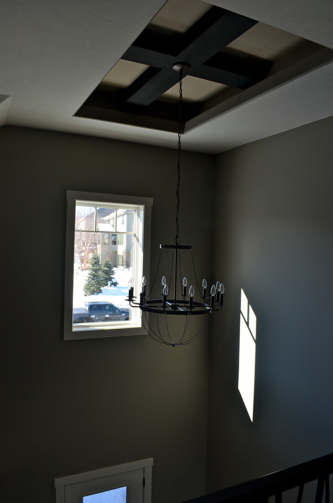Inspiration for a rustic entryway remodel in Omaha