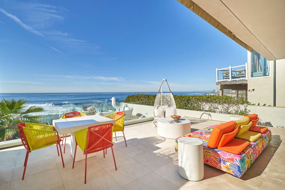 This is an example of a beach style patio in San Diego.