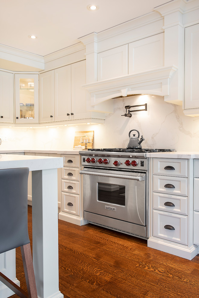 Example of a transitional kitchen design in Toronto