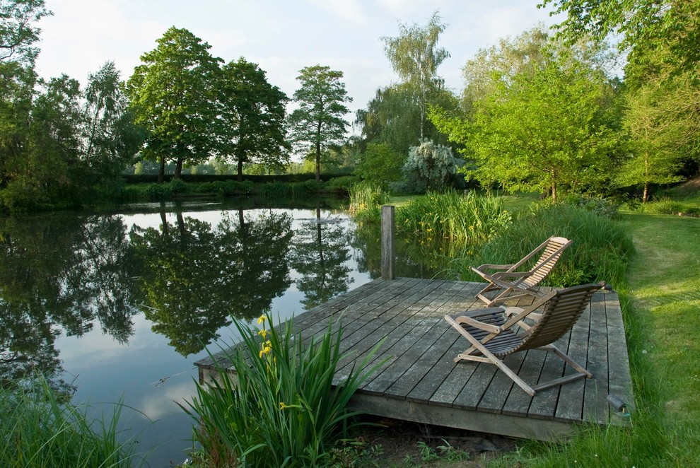 Design ideas for a country deck in West Midlands with a water feature.