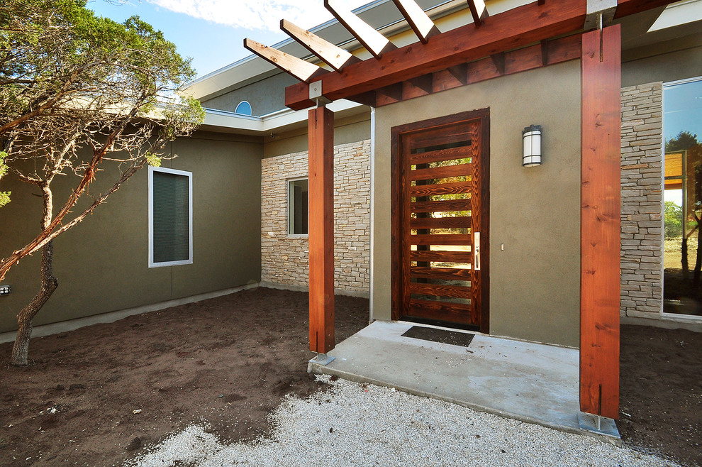 This is an example of a contemporary entryway in Austin.