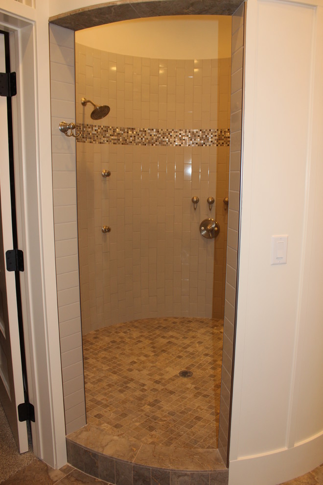 Large transitional master bathroom in Salt Lake City with shaker cabinets, grey cabinets, an open shower, a bidet, gray tile, subway tile, grey walls and an undermount sink.