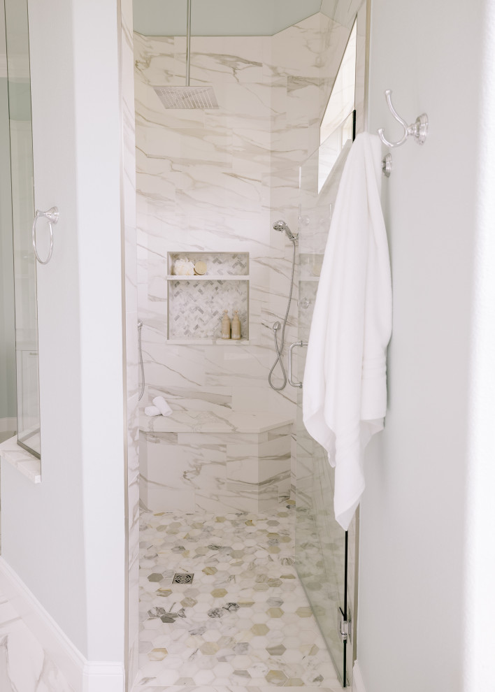 Inspiration for a large transitional master bathroom in Orlando with beaded inset cabinets, white cabinets, a freestanding tub, a curbless shower, white tile, porcelain tile, blue walls, porcelain floors, engineered quartz benchtops, white floor, a hinged shower door, white benchtops, a niche, a double vanity and a built-in vanity.