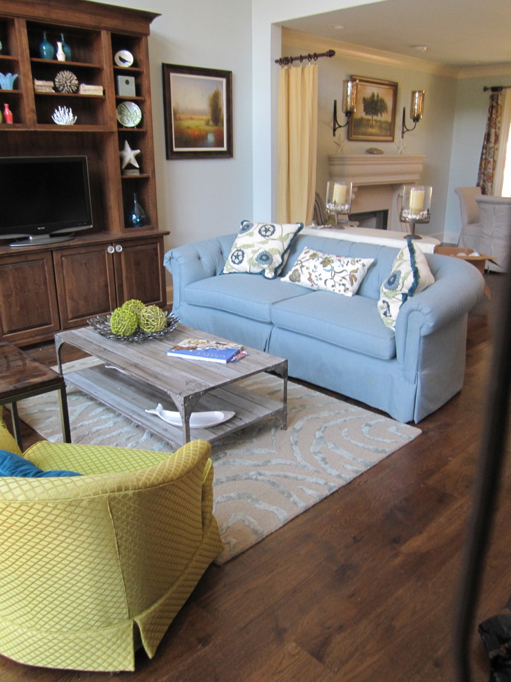 Inspiration for a beach style living room in Atlanta with a freestanding tv.