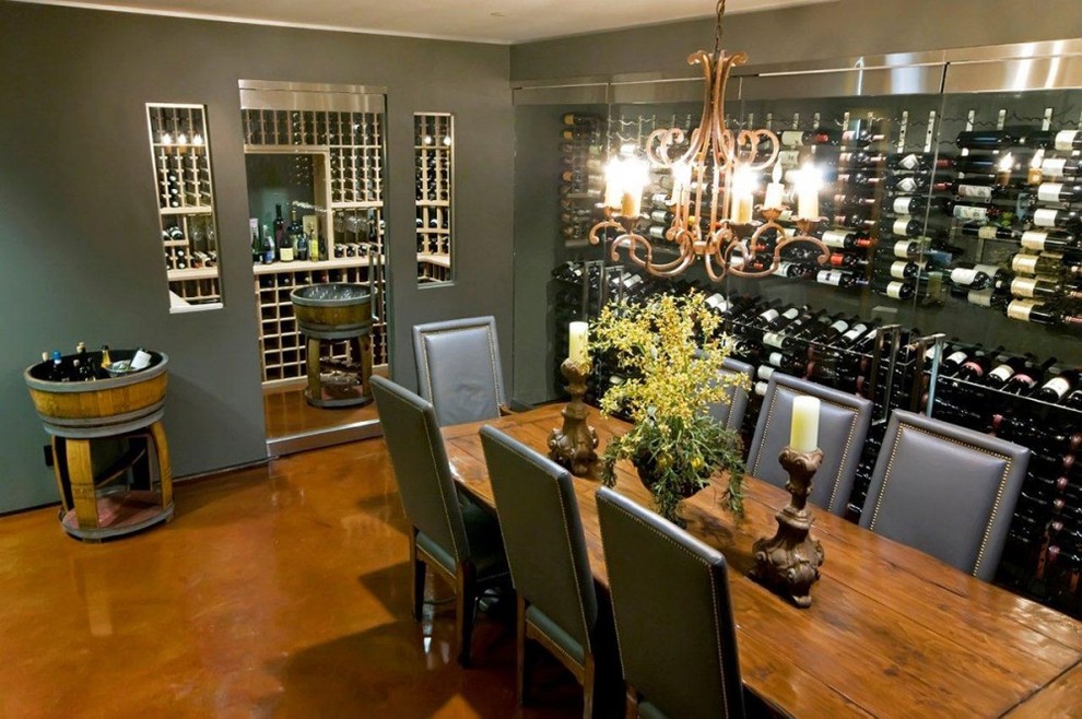 Design ideas for a mid-sized traditional wine cellar in Los Angeles with concrete floors and storage racks.
