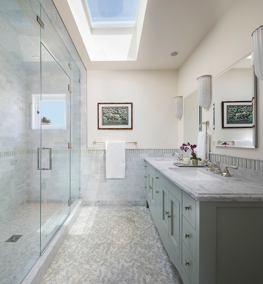 Mid-sized traditional master bathroom in San Francisco with open cabinets, an alcove tub, a shower/bathtub combo, a one-piece toilet, white tile, marble, multi-coloured walls, mosaic tile floors, a pedestal sink, white floor, a hinged shower door, green cabinets and marble benchtops.