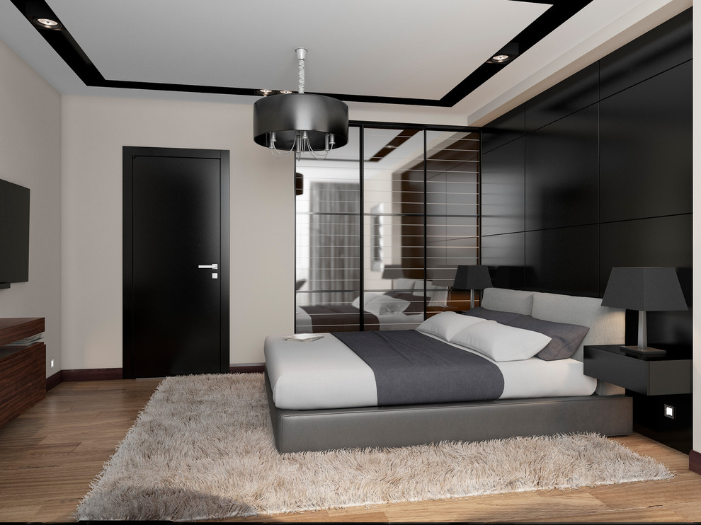 спальня с темной стеной