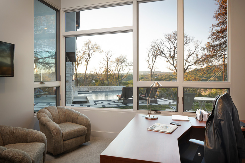 This is an example of a contemporary home office in Austin.