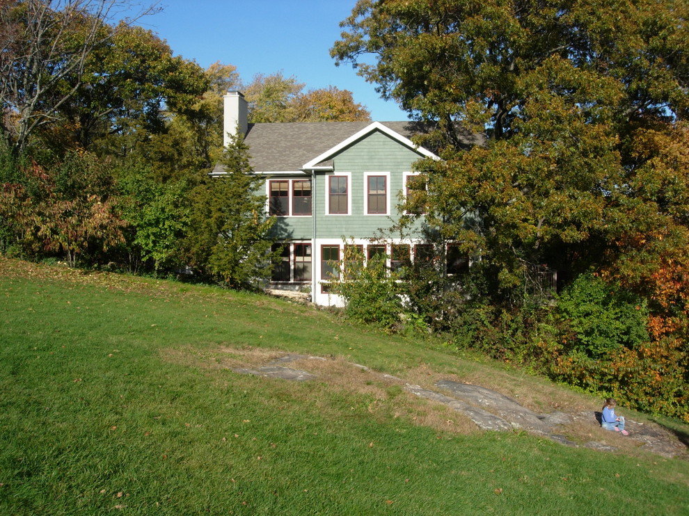 Photo of a country exterior in Boston with wood siding.
