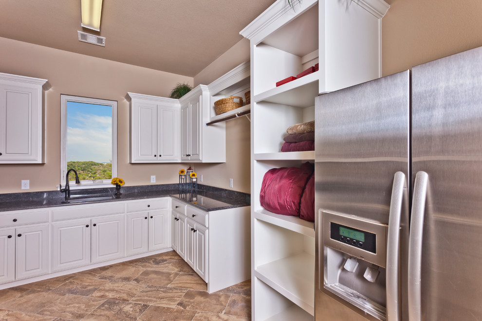 Photo of a contemporary laundry room in Austin.