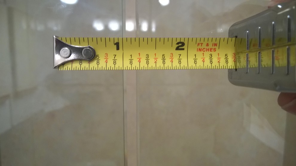 Gap between shower door and fixed panel