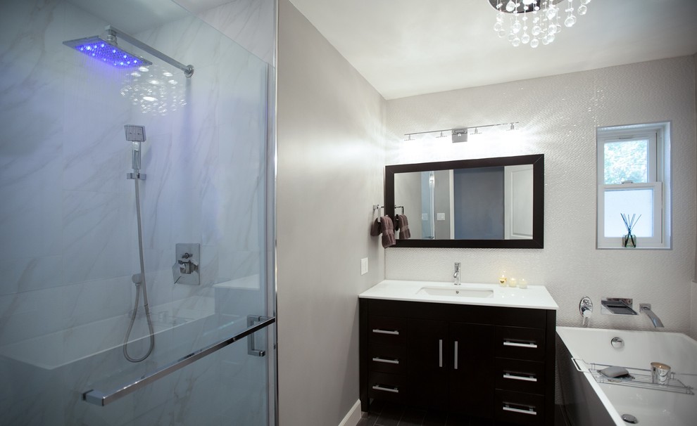 Example of a mid-sized minimalist porcelain tile bathroom design in Los Angeles with flat-panel cabinets, dark wood cabinets and gray walls