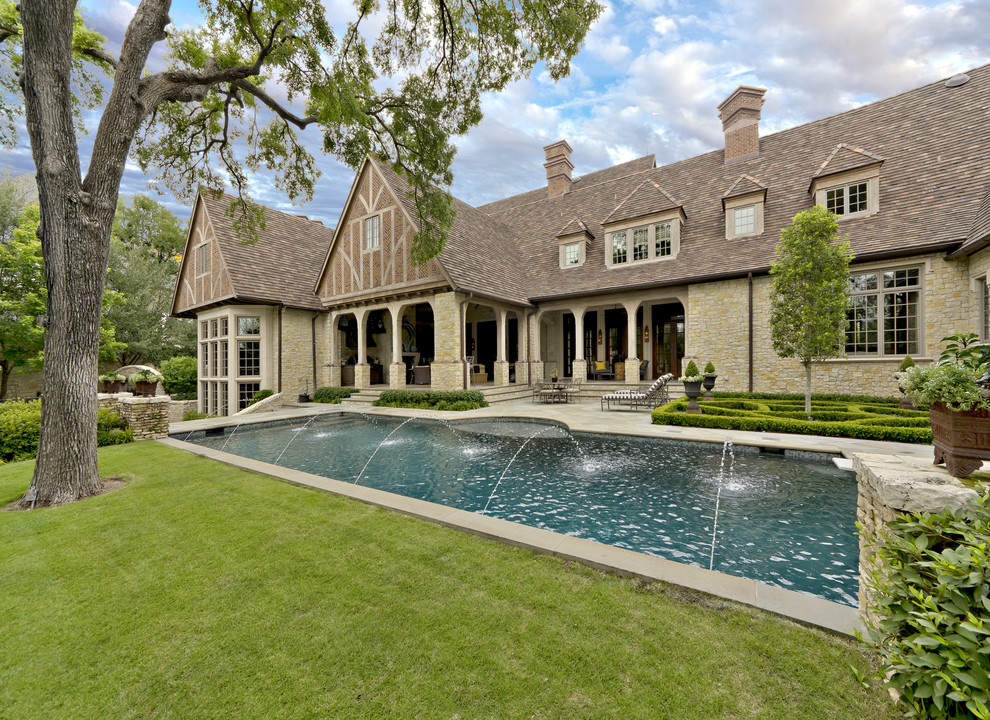 Inspiration for a traditional backyard rectangular pool in Dallas.