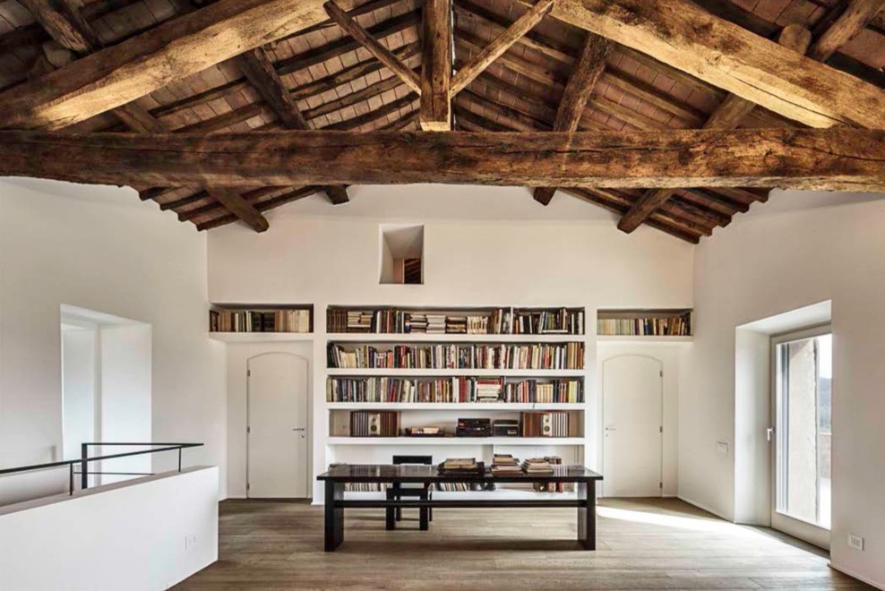 Inspiration for a large modern open concept family room in Cagliari with white walls and medium hardwood floors.