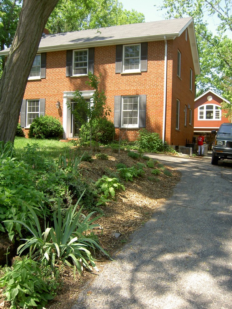 This is an example of a small country front yard shaded driveway for summer in St Louis.