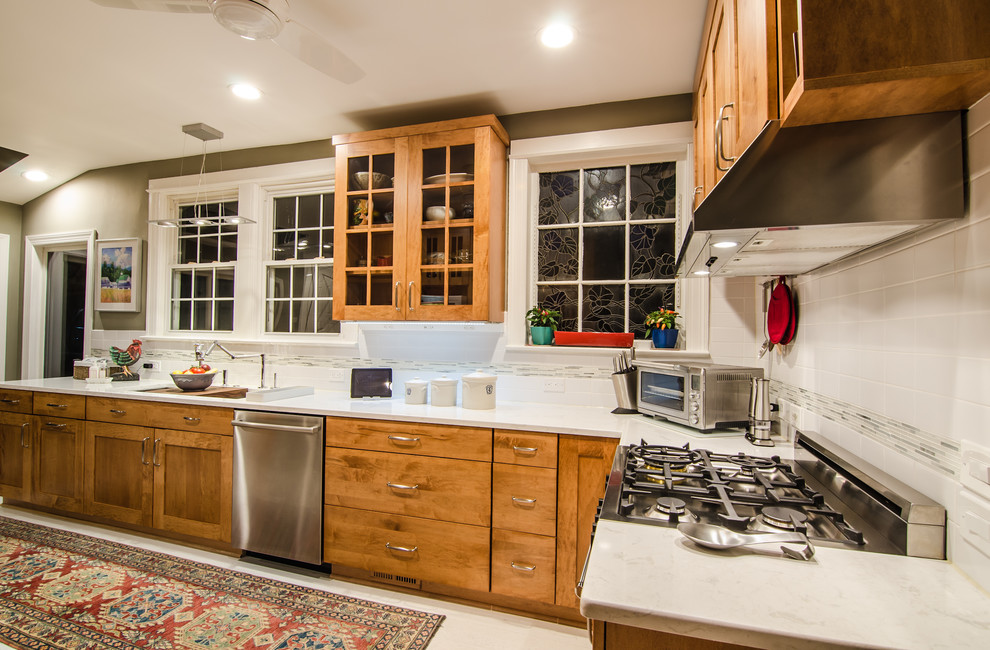 Large transitional l-shaped cork floor eat-in kitchen photo in DC Metro with an undermount sink, flat-panel cabinets, quartz countertops, white backsplash, glass tile backsplash, stainless steel appliances and no island