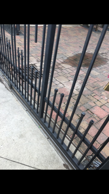 Wrought Iron Fence Renewed & Repainted.