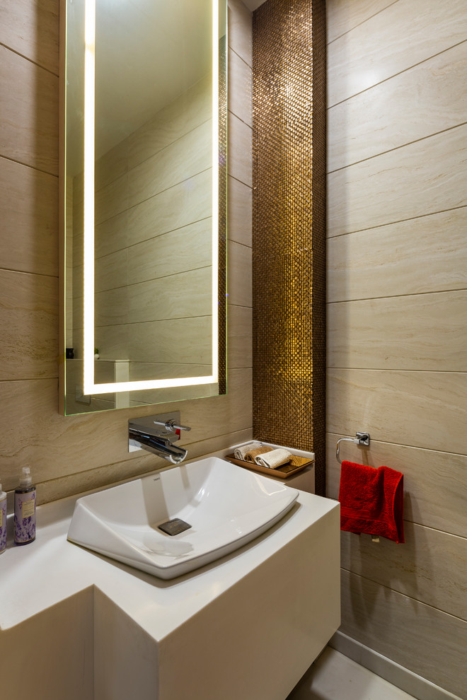 Photo of a contemporary powder room in Delhi with a vessel sink and white benchtops.
