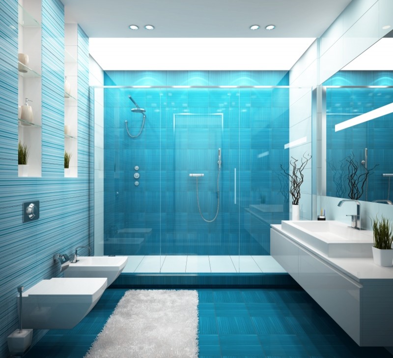 Photo of a large contemporary master bathroom in Brisbane with an undermount sink, furniture-like cabinets, white cabinets, an open shower, a one-piece toilet, blue tile, ceramic tile, blue walls and light hardwood floors.