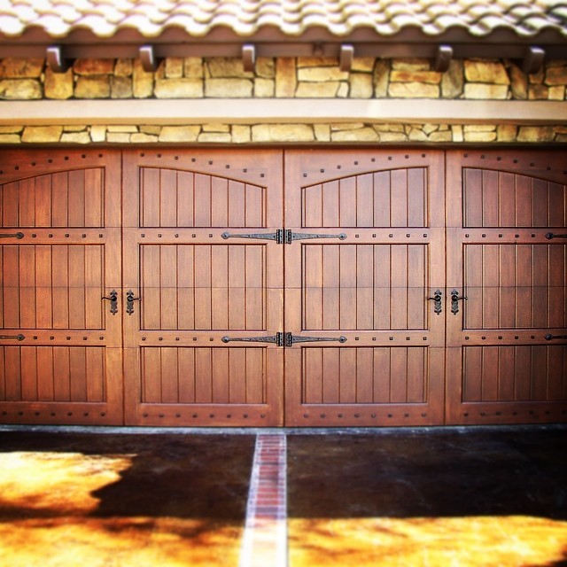 Design ideas for a mid-sized country two-car garage in Los Angeles.