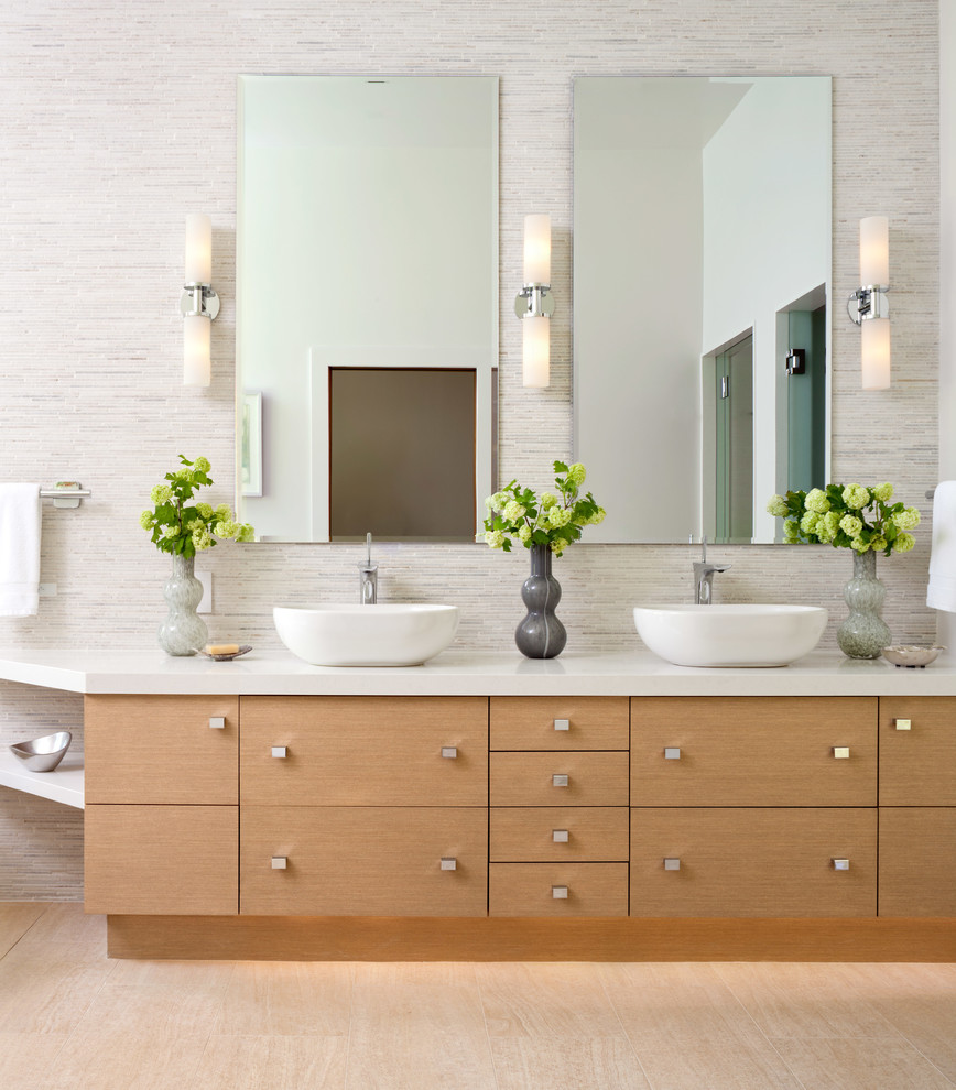Inspiration for a large contemporary master bathroom in Denver with a vessel sink, flat-panel cabinets, light wood cabinets, engineered quartz benchtops, gray tile, matchstick tile, white walls and porcelain floors.