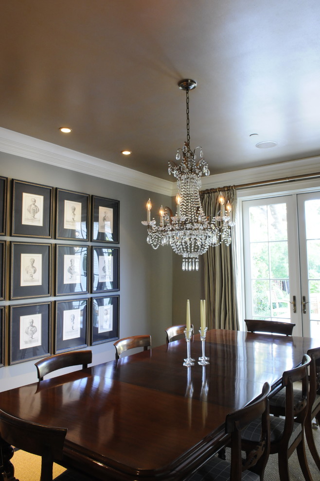 Traditional dining room in Orange County with grey walls.