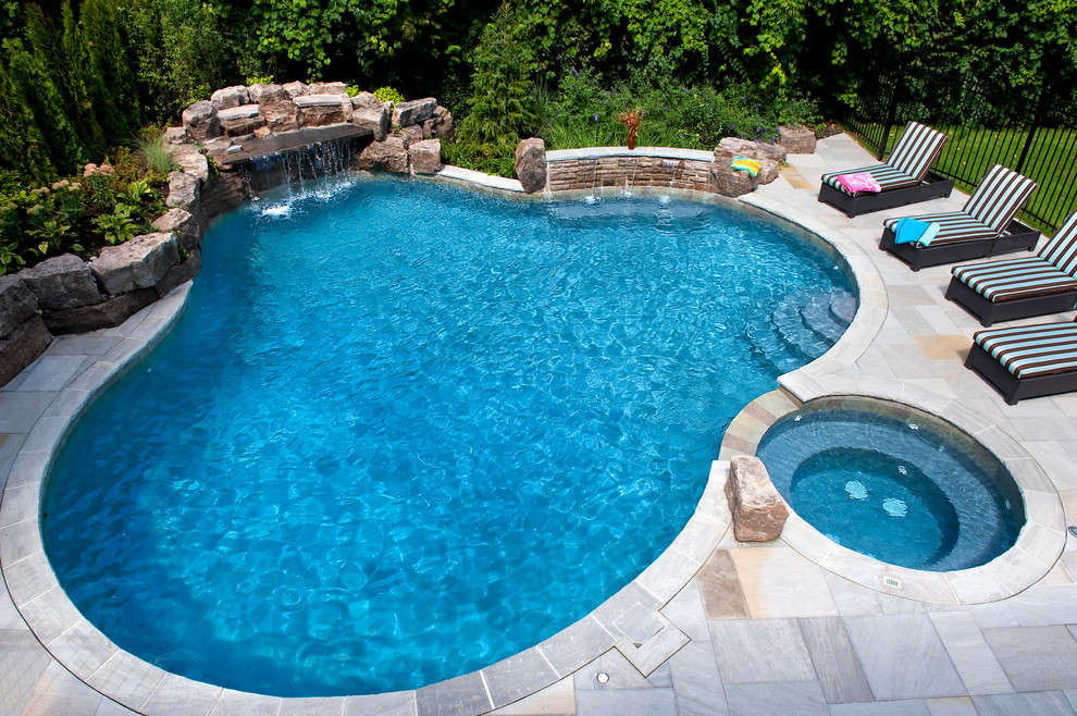 Inspiration for a traditional custom-shaped pool in Toronto.