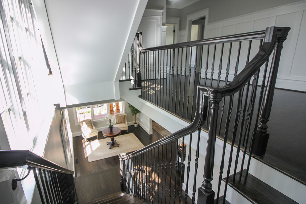 Staircase - large transitional wooden l-shaped mixed material railing staircase idea in DC Metro with painted risers