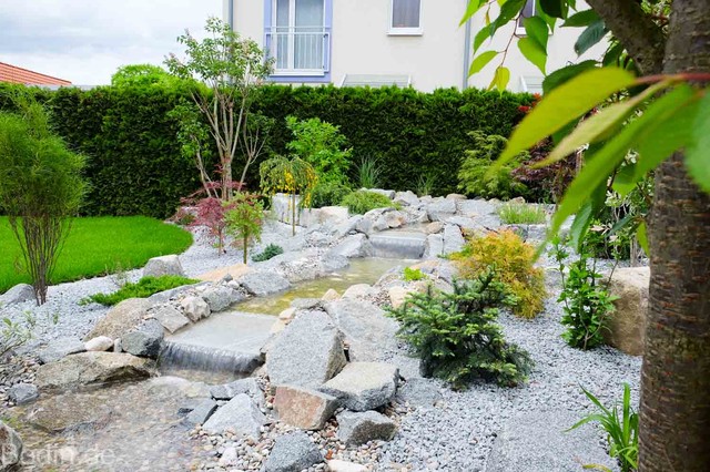 Gartenumgestaltung mit Bachlauf garden