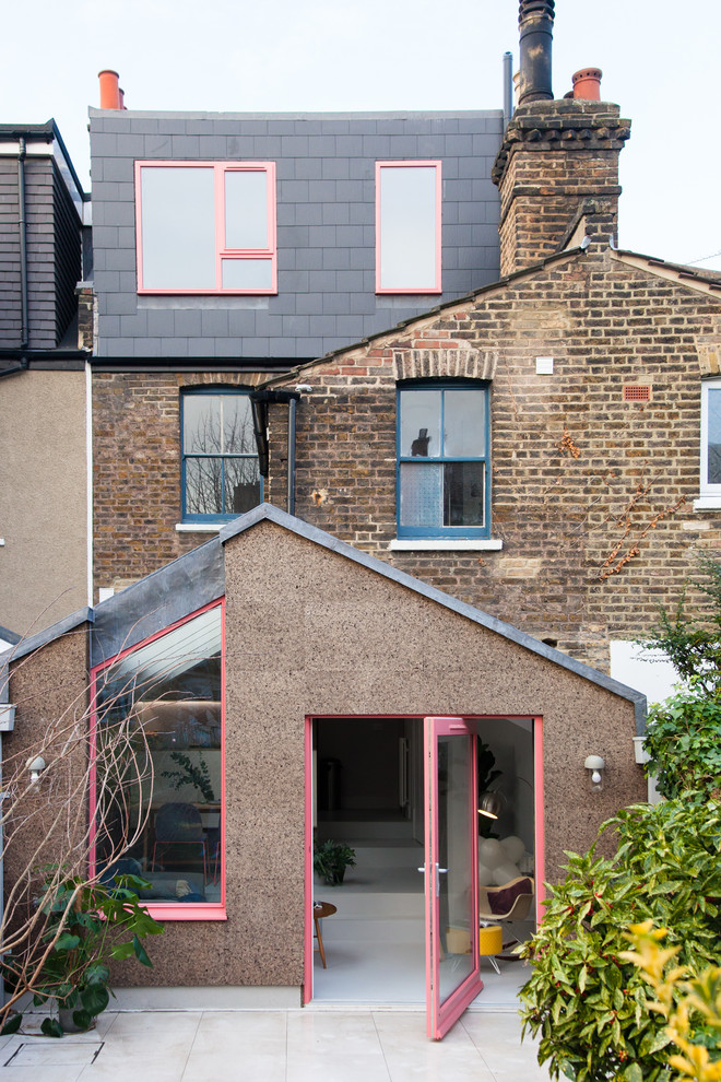 Photo of a mid-sized contemporary home design in London.