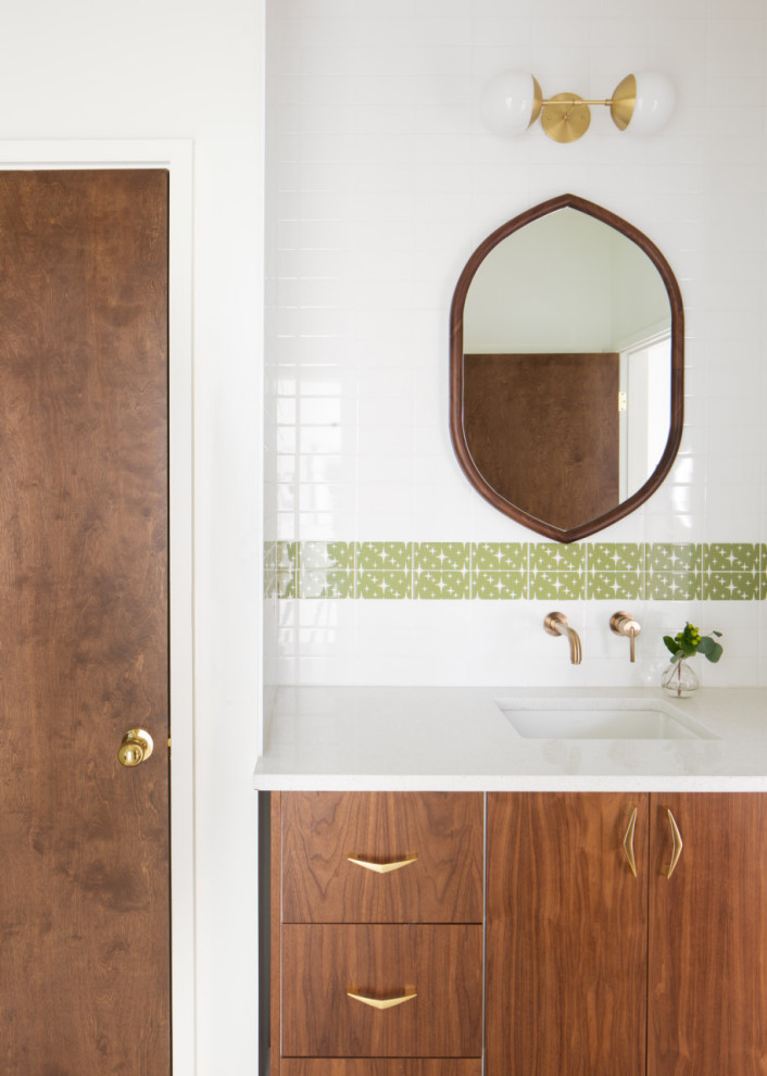 Photo of a mid-sized midcentury kids bathroom in Detroit with flat-panel cabinets, dark wood cabinets, an open shower, a one-piece toilet, green tile, ceramic tile, white walls, ceramic floors, an undermount sink, quartzite benchtops, white floor, a hinged shower door, white benchtops, a niche, a double vanity, a floating vanity and wallpaper.