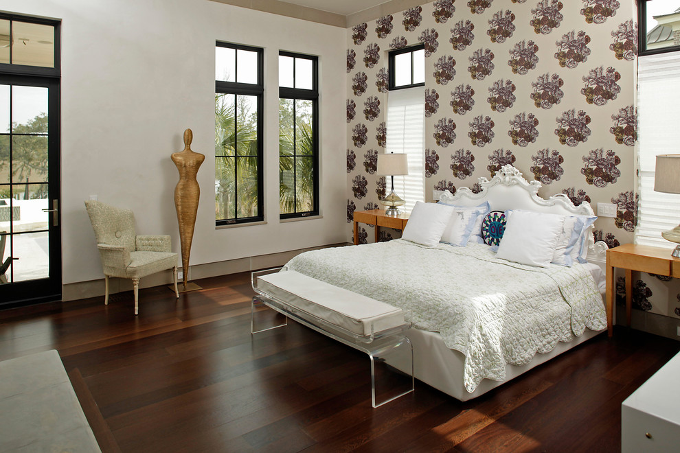 Inspiration for an eclectic master bedroom in Charleston with multi-coloured walls and medium hardwood floors.