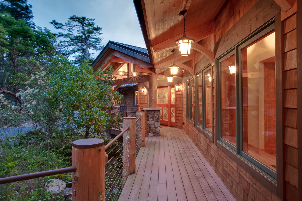 This is an example of a country deck in Seattle with a roof extension.