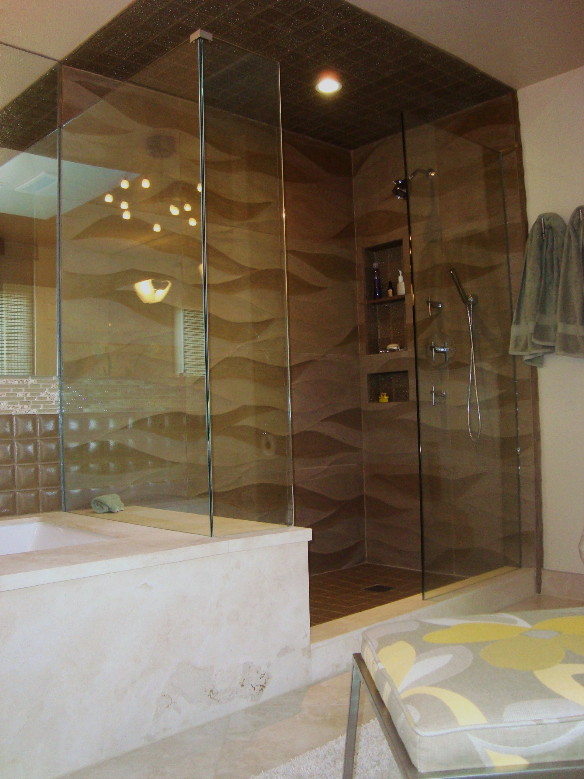 Lofrano Master Bath and Shower with a wave like textured tile