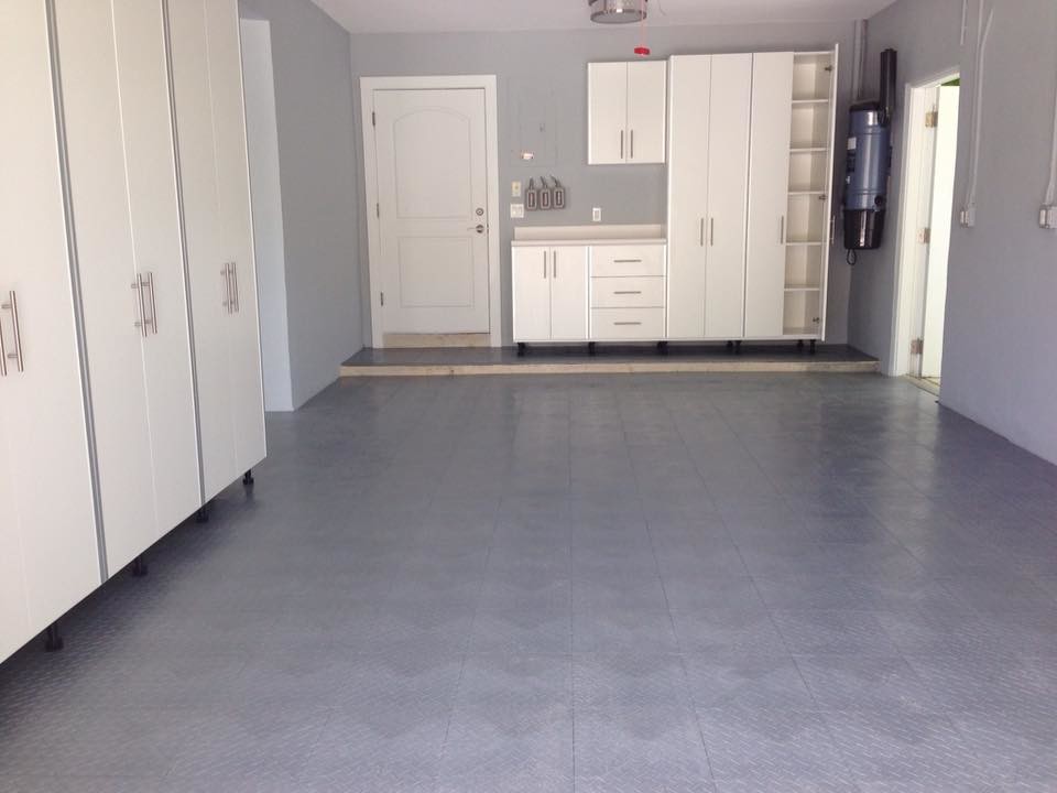 Garage - large transitional attached two-car garage idea in Miami