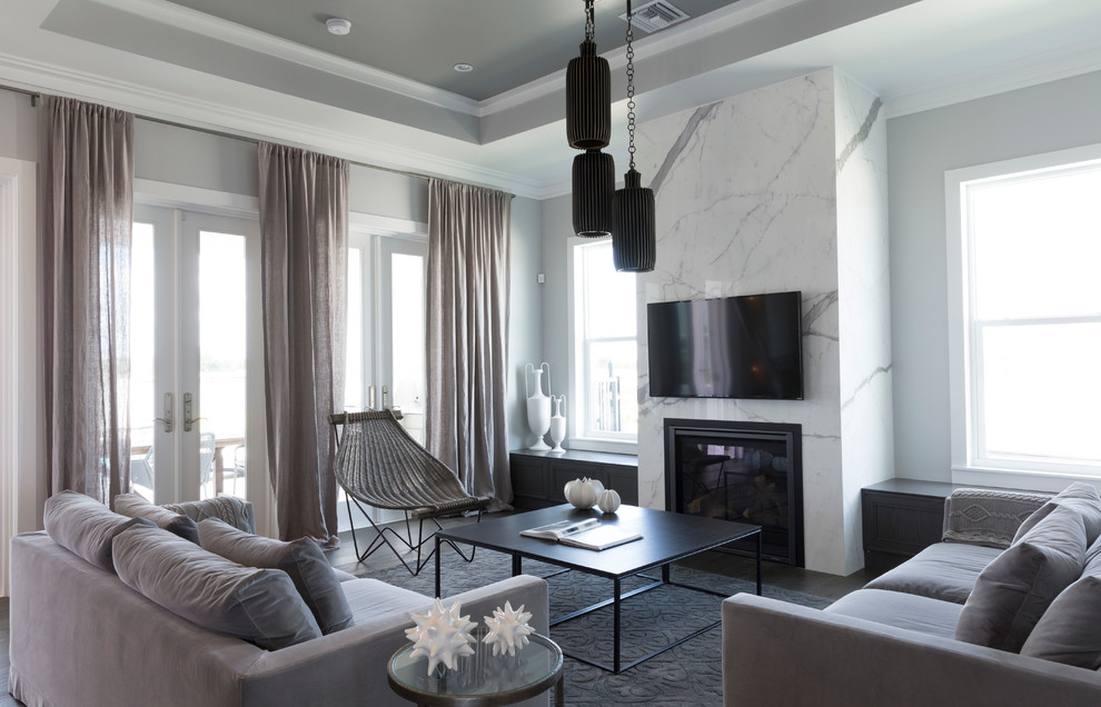 Photo of a mid-sized transitional formal open concept living room in Miami with white walls, a standard fireplace, a stone fireplace surround and a wall-mounted tv.