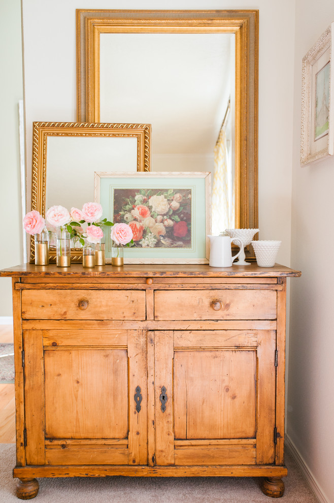 Example of a small cottage chic enclosed living room library design in Portland with beige walls and no tv