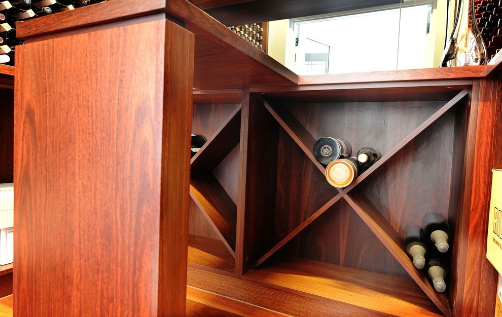 Inspiration for a mid-sized contemporary wine cellar in Adelaide with storage racks.