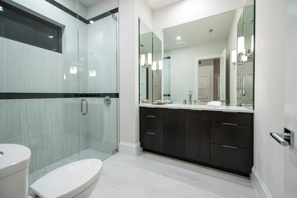 Photo of a medium sized beach style shower room bathroom in Other with flat-panel cabinets, dark wood cabinets, an alcove shower, a one-piece toilet, beige walls, ceramic flooring, a submerged sink, beige floors, a hinged door, a single sink and a built in vanity unit.