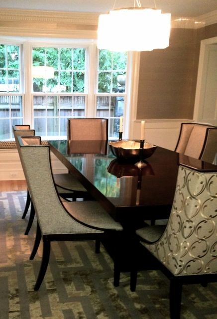 Large transitional separate dining room in DC Metro with beige walls, light hardwood floors and no fireplace.