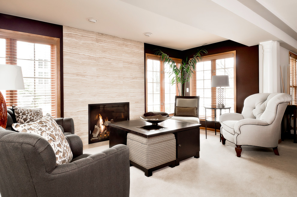 Photo of a mid-sized transitional formal open concept living room in Chicago with brown walls, a standard fireplace, carpet, a tile fireplace surround and no tv.