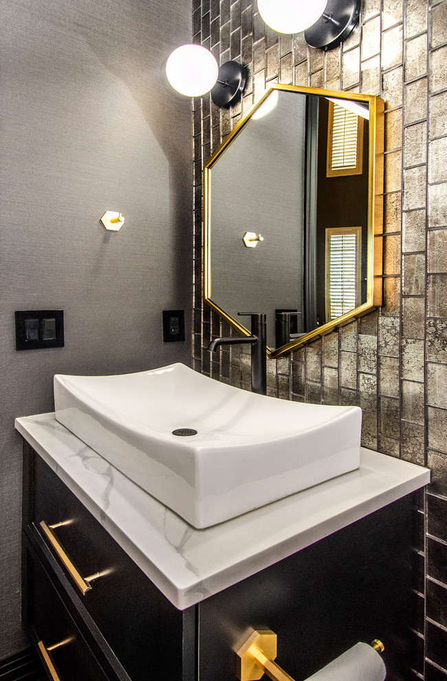 Inspiration for a small contemporary 3/4 bathroom in Dallas with flat-panel cabinets, black cabinets, a two-piece toilet, multi-coloured tile, glass tile, black walls, ceramic floors, a vessel sink, engineered quartz benchtops, black floor and white benchtops.