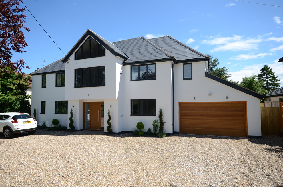 Large contemporary three-storey white exterior in Buckinghamshire.