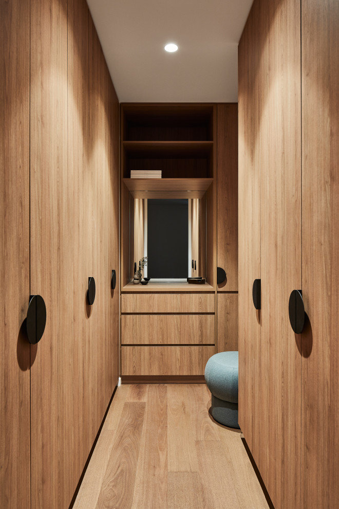 This is an example of a contemporary storage and wardrobe in Melbourne.
