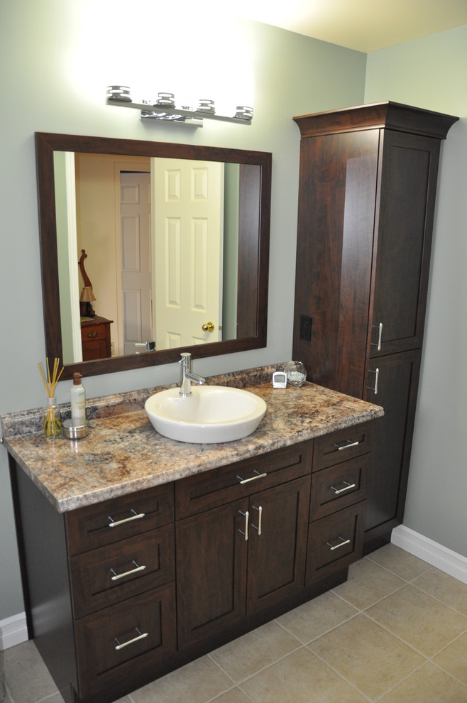 Example of a mid-sized transitional beige tile and porcelain tile porcelain tile home design design in Ottawa with a vessel sink, shaker cabinets, dark wood cabinets, laminate countertops, gray walls and a one-piece toilet