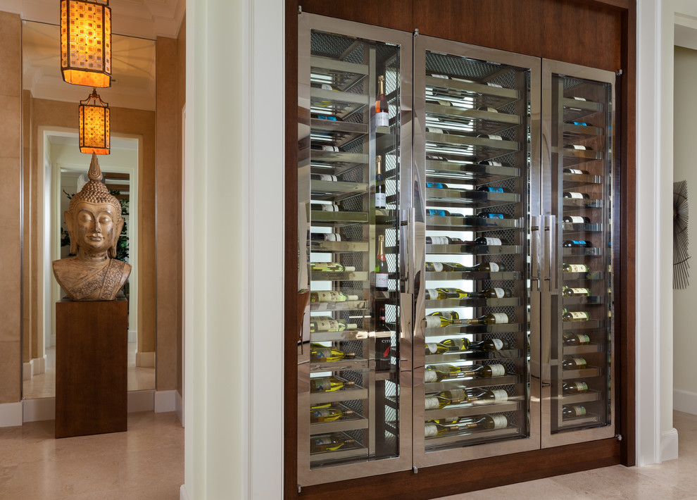 Design ideas for a small transitional wine cellar in Miami with display racks.