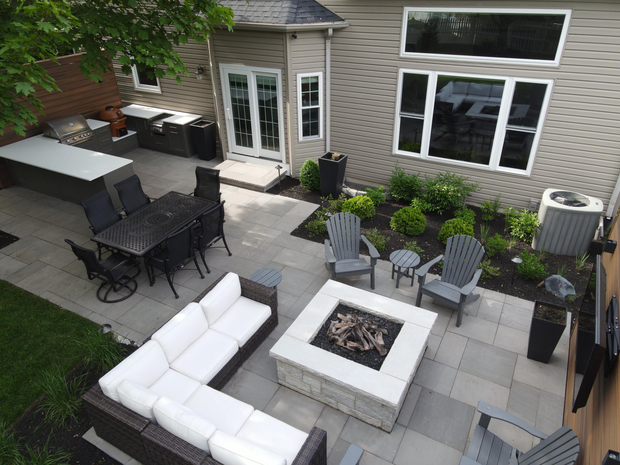 Outdoor Great Room featuring TV & Gas Fire Pit