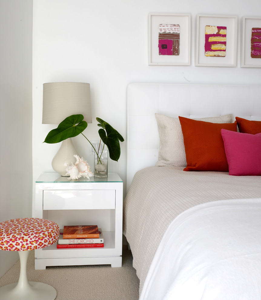Beach style carpeted bedroom photo in Los Angeles with white walls